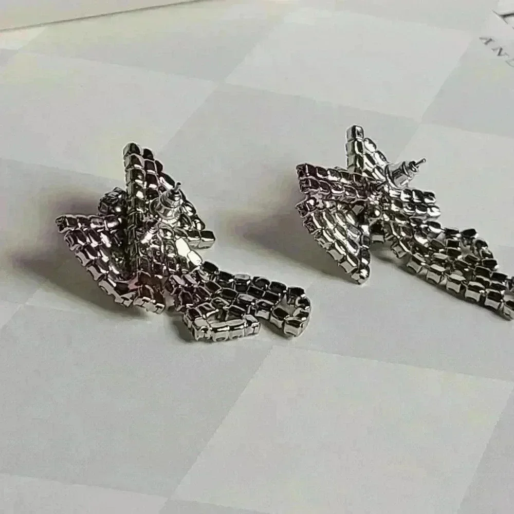 Silver tone clear rhinestones bow earrings - Picture 11 of 17